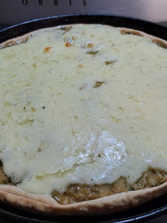 Una foto de Tarta de cebollas y quesos