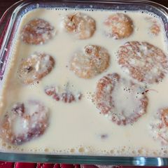 A picture of Malpua with rabdi.