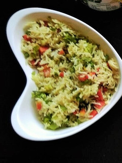 A picture of Warm broccoli rice salad.