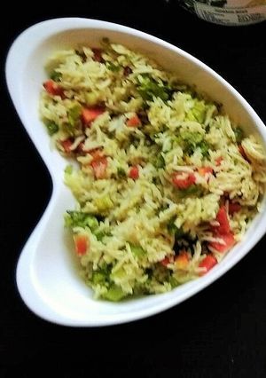 A picture of Warm broccoli rice salad.
