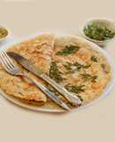 Butter dosa topped with baloon vine leaves