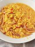 Arroz caldoso con patas de calamar