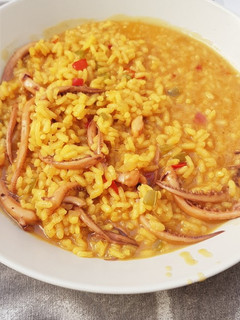 Una foto de Arroz caldoso con patas de calamar