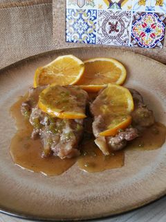 Una foto de Chuletas de cerdo en salsa de naranja