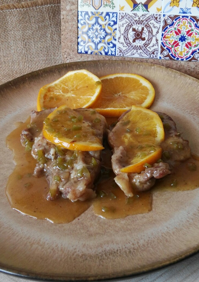 Una foto de Chuletas de cerdo en salsa de naranja