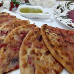 A picture of Oniontomato parantha.