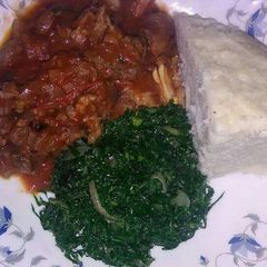 A picture of Beef stew with Sukuma wiki.