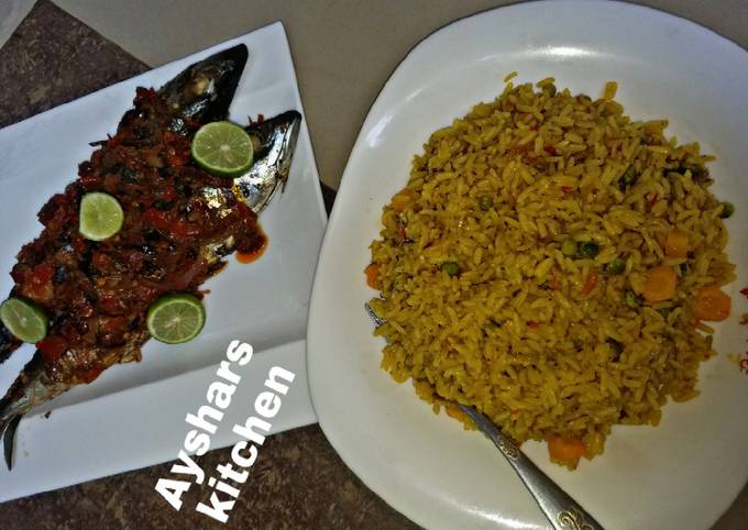 Simple jollof rice and griled fish