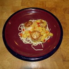 A picture of Seared scallops with pineapple.