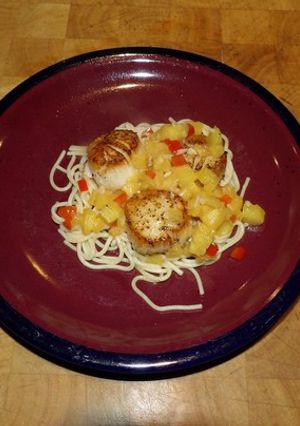 A picture of Seared scallops with pineapple.