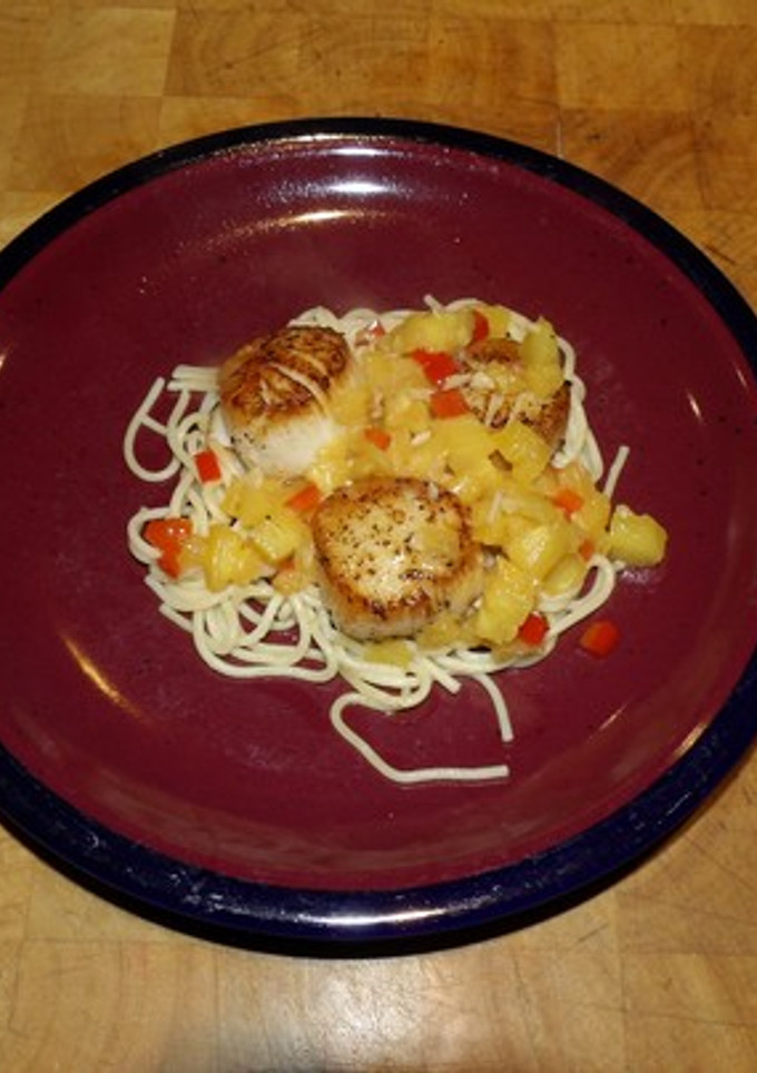 A picture of Seared scallops with pineapple.