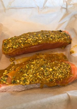 A picture of Salmon with pistachio and turmeric crust.