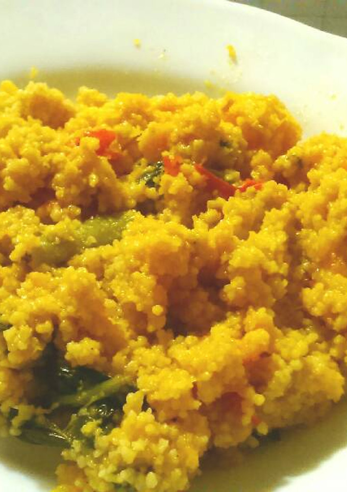 Una foto de Cous cous con calabaza y espinacas vegano