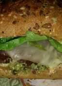 Michael's FLG (Finger Licking Good) Angus beef and basil Pesto cheeseburger with provolone and sun dried tomatoes