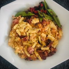 Loaded(Bacon+Red Onions) Crispy Mac and Cheese with Chilli-Soy-Sugarsnaps side A picture of Loaded(Bacon+Red Onions) Crispy Mac and Cheese with Chilli-Soy-Sugarsnaps side.