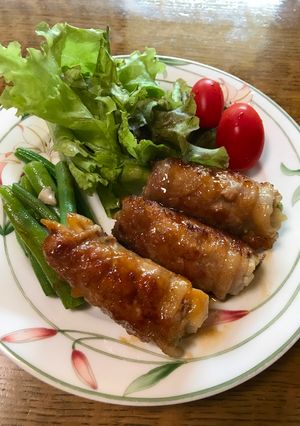 A picture of Japanese pork roll ups.