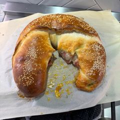 A picture of Pepperoni and Salami Stromboli.