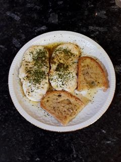 Una foto de Queso fresco asado con especias