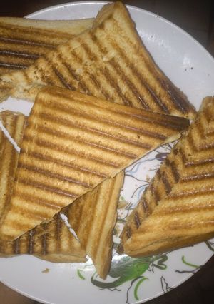 A picture of Toasted bread with hot tea or.