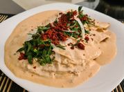 Una foto de queso crema camembert