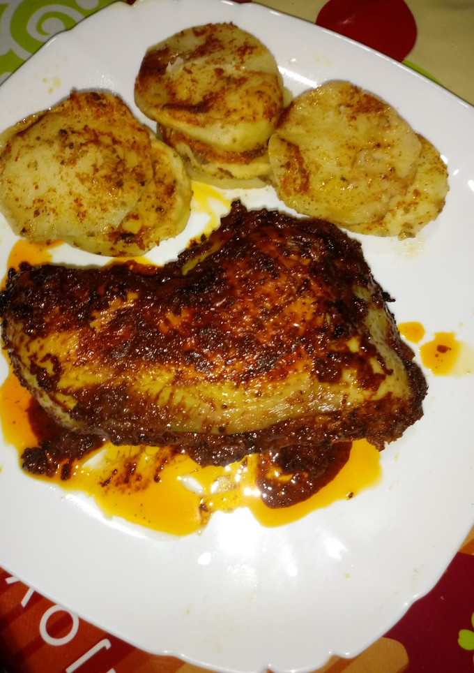 Una foto de Pollo tandoori en la cecofry 4D con patatas especiadas al horno