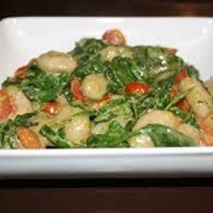A picture of Gnocchi with Young Green and Red Tomato Sauce.