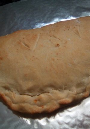 Una foto de Calzone de calabacín y queso de cabra