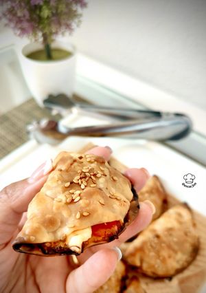 Foto principal de Mini empanadillas de bonito con cherry y feta