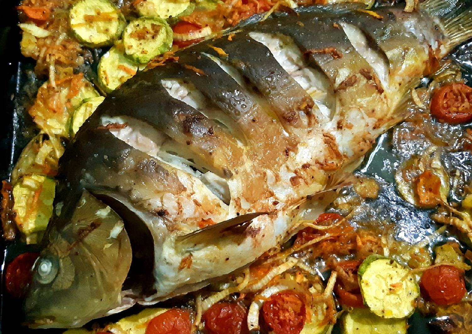 Как запечь рыбу в духовке в фольге целиком рецепт с фото пошагово
