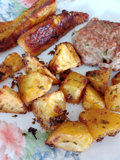 Una foto de Papas asadas