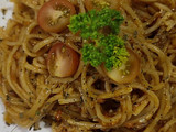 Pasta con tiras de cerdo y cubios
