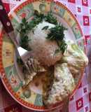 Relleno de carne envuelto en repollo con salsa blanca light y arroz
