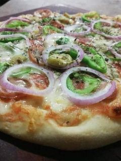 Una foto de Como hacer masa para pizza paso a paso