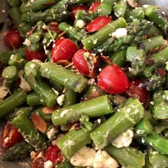 A picture of Asparagus, tomato, and feta salad with balsamic vinaigrette.