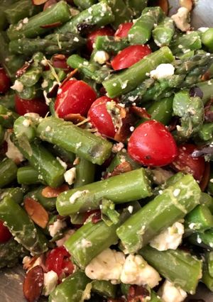 A picture of Asparagus, tomato, and feta salad with balsamic vinaigrette.