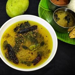 A picture of Mavinakaayi Saaru/ Andhra Style Raw mango Rasam.