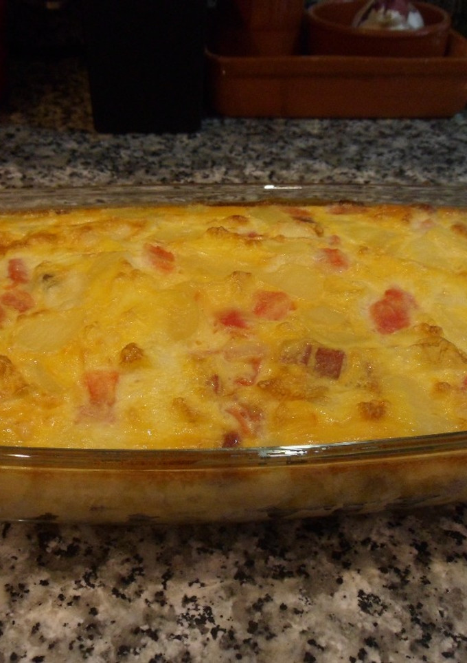 Una foto de Tortilla de papas, jamón y queso al horno