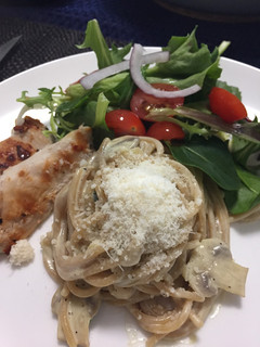 A picture of Wholemeal spagetti mushroom with grilled chicken.