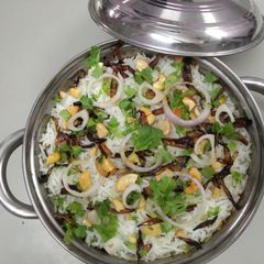 A picture of Veg layered biryani.