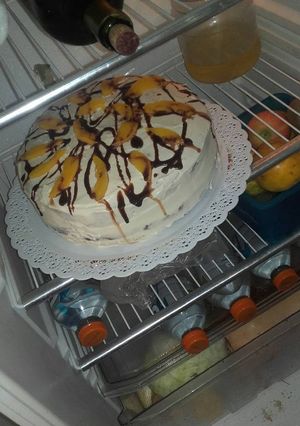 Una foto de Torta de crema y duraznos