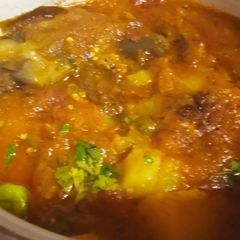 A picture of Three spice Aloo bengan.