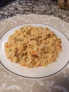 Una foto de Revuelto de merluza con pimientos y patata