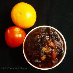 A picture of Sweet and sour Tomato and orange chutney.