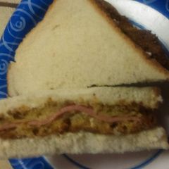 A picture of Corn breaded bologna sandwich.