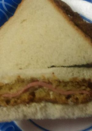 A picture of Corn breaded bologna sandwich.