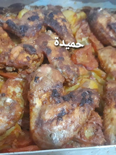 صورة لوصفة اجنحة دجاج محمرة بالخضر