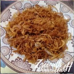 A picture of Birista/Deep Fried Sliced Onions.