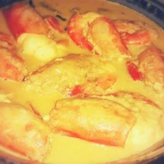 A picture of Bengali Prawn in Coconut Milk Curry/ Chingri Maacher Malai Curry.