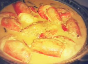 A picture of Bengali Prawn in Coconut Milk Curry/ Chingri Maacher Malai Curry.