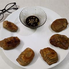 Vegetable Dumplings | Momos | without steamers, onion and garlic A picture of Vegetable Dumplings | Momos | without steamers, onion and garlic.